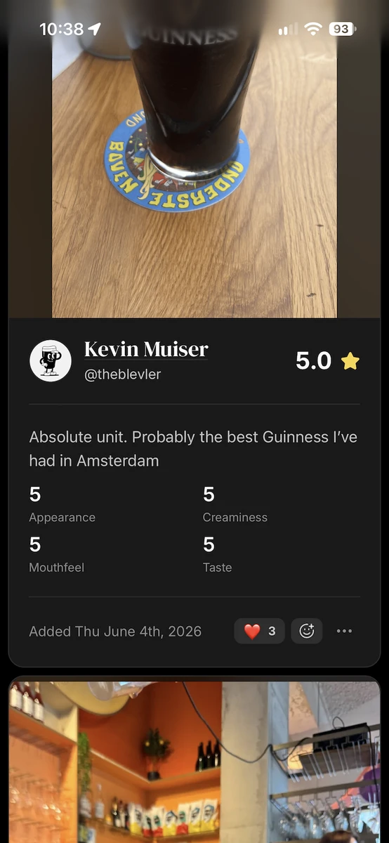 A review card with a ❤️ reaction count and the face button for adding your own